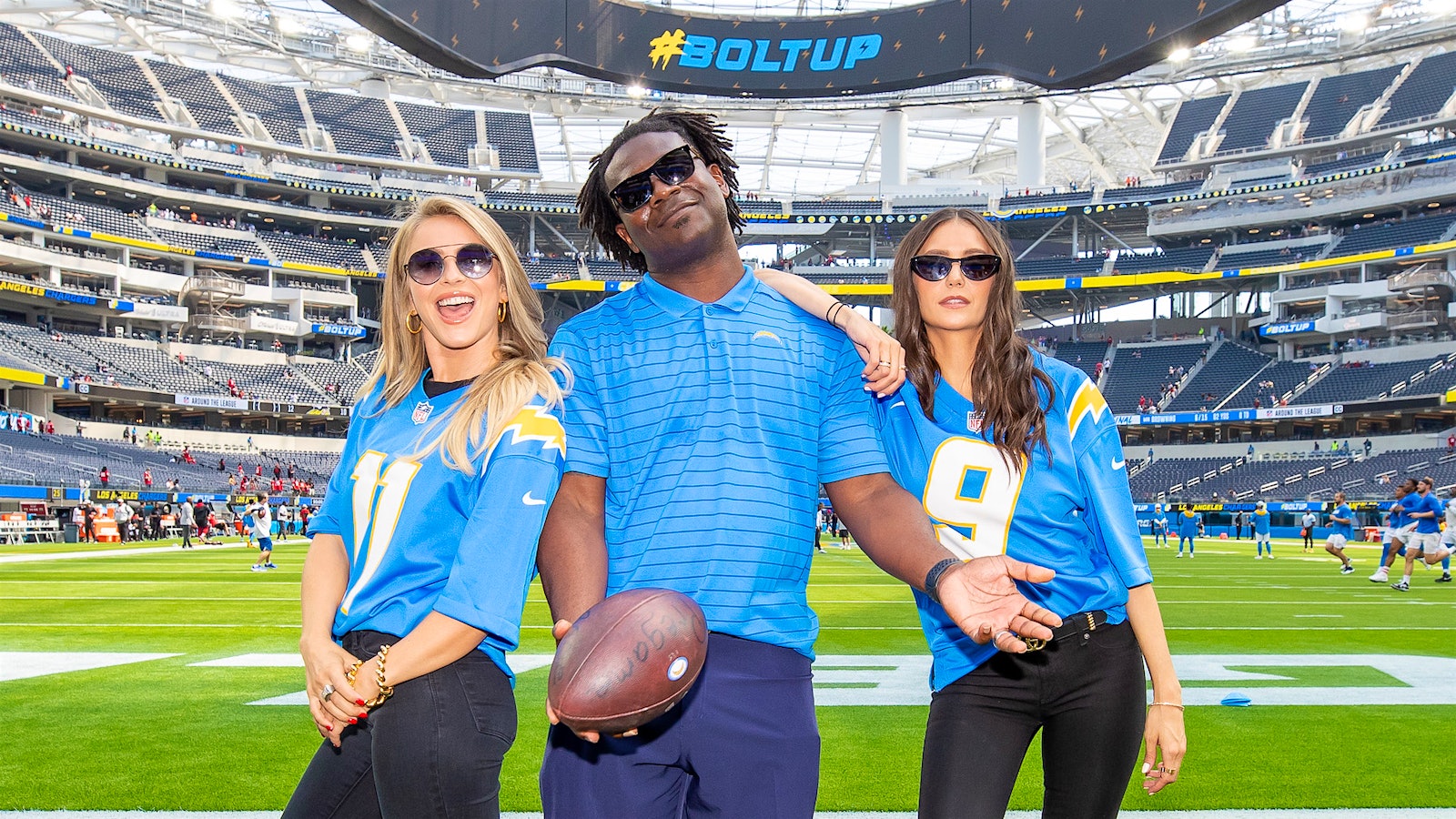 Choreographer Julianne Hough (left), retired Chargers running back LaDainian Tomlinson and actress Nina Dobrev celebrate the arrival of Fresh Vine Wine at SoFi Stadium